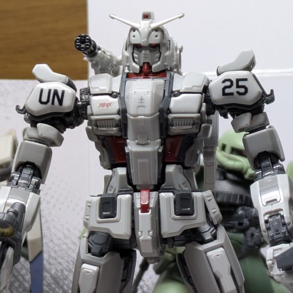 HG RX−78(G)E ガンダムEXデカール貼り完了!!キット付属のマーキングシールは機体表記のみ使用。他はアルファベットデカールとガンダムデカールを使用して国連地上軍第25機械化強襲大隊所属に。肩にはあの企業の姿も…。因みに左肩後ろの02はガンダムEXの2号機の意味で