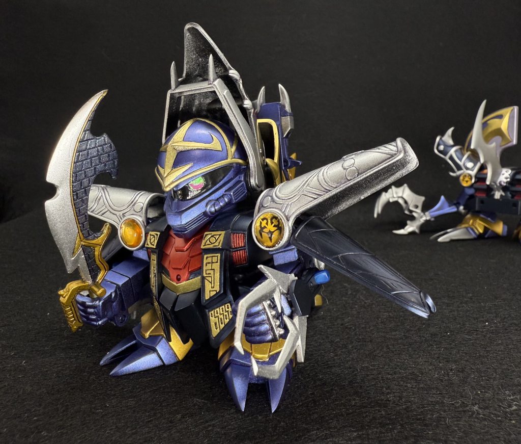 以上、SD戦国伝のラスボス、闇皇帝でした。今回は“闇皇帝“ではなく“黒魔神闇皇帝“のキットを使用しており、天下統一編に登場した最終形態も再現可能です。“後ろ“の部分も完成しておりますが、今はまだ役者が揃っていたいのでこちらはまたの機会に。「光あるところに闇がある」ということで光と闇は表裏一体。後ほど“光“の方も投稿させていただきますので宜しければご覧ください。最後までご覧いただきありがとうございました(zaku-kao5)“次回を待て“