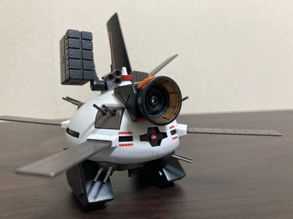 【オリジナル設定】月面防衛用に配備されていたルナタンクの残存機は後に開発されるMAの武装テストに転用された。本機はその内の一機であり、アプサラスやビグ・ザムに搭載される予定の指向性のあるメガ粒子砲のテスト機として改修された。