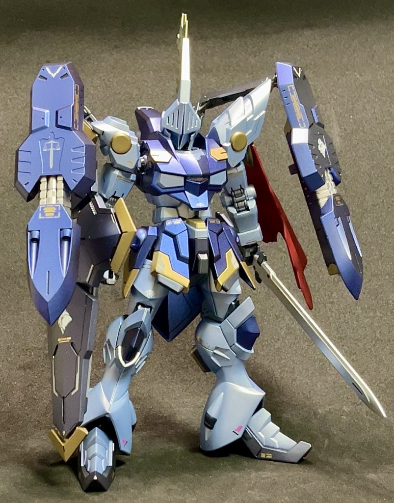 バックパックシールドの前面展開ミキシング元の機体設定だと左肩のマントもシールドとして使用可能なので実質シールド4枚持ちの堅守な機体なのです。