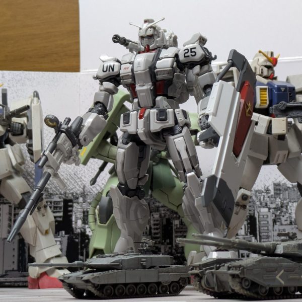 HG RX−78(G)E ガンダムEXデカール貼り完了!!キット付属のマーキングシールは機体表記のみ使用。他はアルファベットデカールとガンダムデカールを使用して国連地上軍第25機械化強襲大隊所属に。肩にはあの企業の姿も…。因みに左肩後ろの02はガンダムEXの2号機の意味で