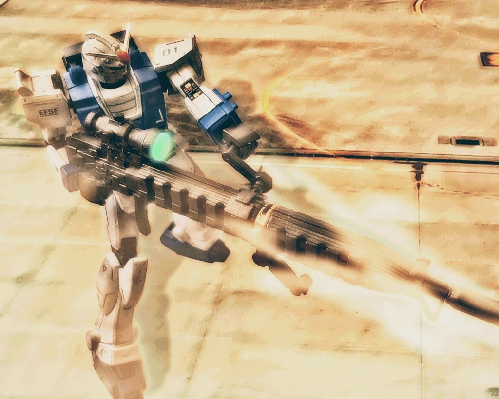 「…やらせはしないんだよ…、だからさっ…!」試作大型ビームライフルの銃口から煙が立つさまは、まさにその高出力さを示していた。ライラはシャトルの打ち上げを優先した為に、切り札の一射をミサイルの迎撃に使ったのだ。(…あの機体だけは、…クリスと作り上げたあの機体だけは誰だろうと、やらせる訳にはいかないっ…!!)発射を終えたビームライフルは冷却を開始し再充填に移行する。だが先程の一射は最大出力でありエネルギー残量はほぼ無いに等しかった。「…さあ、どうする…?」ライラは空中でホバリングし周囲を探るイフリート改を見て覚悟を決めた。そして、こちらに気づくと全速力で猛進してくる。「貴様かっ、余計な事をしてくれたのは!?我が剣の錆となるがいいっっ…!!」夕陽を背に赤き光を放つMSは躊躇いなく迫った。