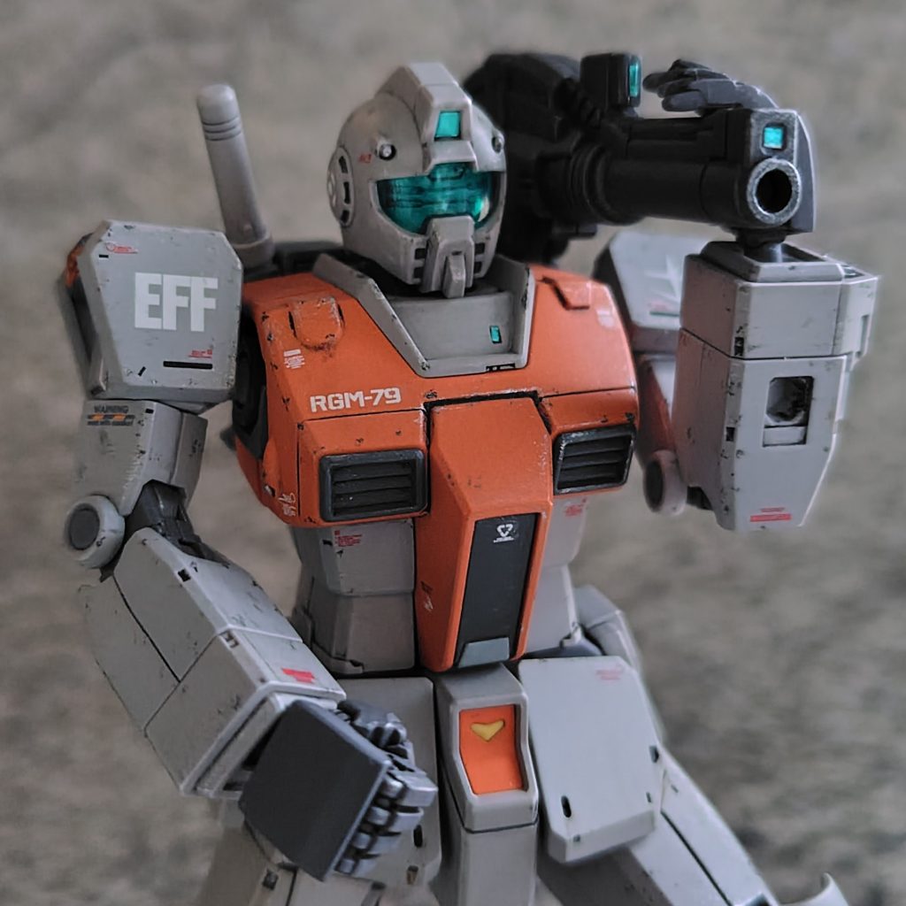 肩に背負った武器