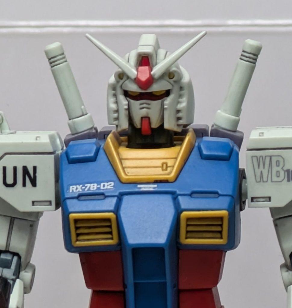 このRX計画はこれまでの各軍および官民の枠組みに囚われずに開発が進められ、宇宙軍のみならず地上軍、空軍、海軍からも技術者が派遣される大計画となった。そしてUC.0079.7月にRX-78-01がロールアウト。更に翌月には02および03もロールアウトしサイド7へ新型強襲揚陸艦