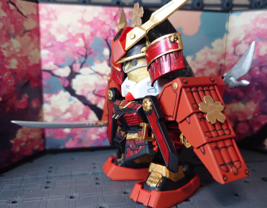 クリアファイルを桜型のパンチで打ち抜いて、ゴールドで塗装 兜用に前立て 両袖にも付けています