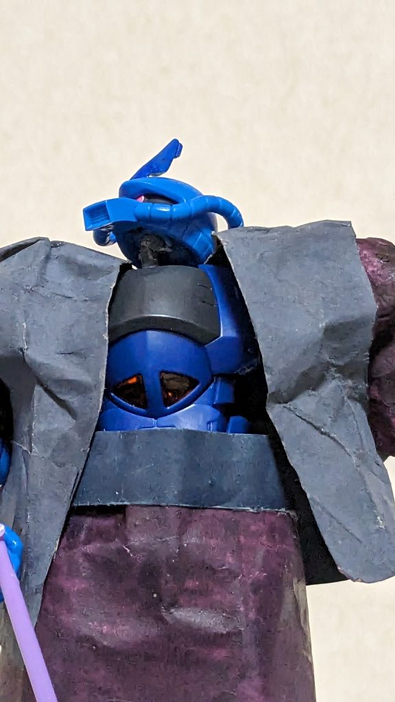 「グッフッフッフ···ハァッハッハッ！ザクとグフの違いもわからんとは！愚か者めが！」