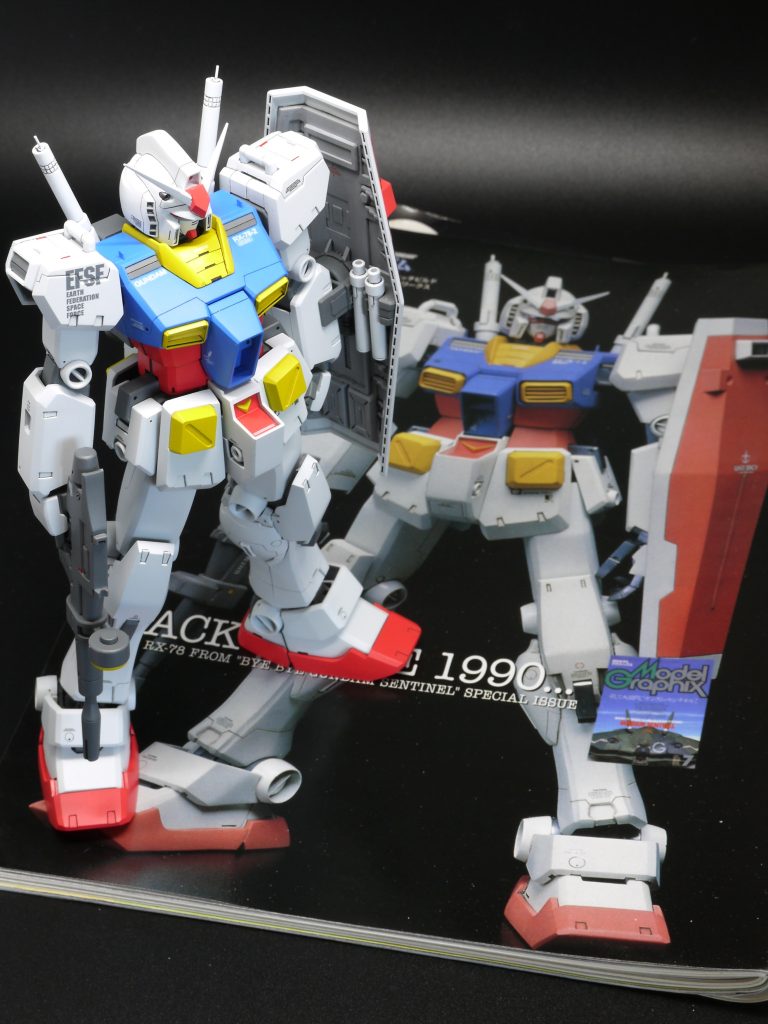 1/72作例を目指しましたが、あらためてキットとは全然違うことを思い知らされました。バイブルなのに踏ん付けてしまってスミマセン。1/72作例はもっと胴がコンパクトで、全体的に線が細いのかなー。頭もスリッパも全然違います。難しいですね。このキットの改修はライフワークのようなもので、毎回楽しんでいます。結果としては全然別モノになりましたが、コレはコレで何とかまとまったかなと思います。写真のアングルはところどころ当時の記事を真似してみましたが…、わかりにくいですかね。Ver.Kaで最終決戦仕様、フルウェポン仕様はめずらしいかと思いますがいかがでしょうか？（写真は少ないですが）次はプレバンから届いたMGの機体をいじります。ご覧いただきありがとうございました。