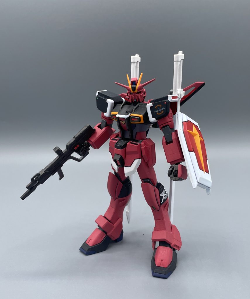 ZGMF-56E2/β　SWORD IMPLUSE SPEC 0.2　劇場版「機動戦士ガンダムSEED FREEDOM」で大活躍した赤いインパルス。RGで商品化されていますが、私は古いHGで作りました。  メタ的な話になりますが、機体の赤は「ルナマリア専用ピンク」で塗装しています。劇中より、やや淡い色合いですが気に入っています。