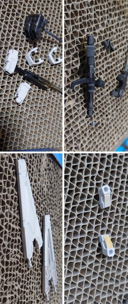 合わせ目消し、肉抜き穴埋めの模様。肉抜き穴埋めは顎裏、首関節ポリキャップ裏、グラスフェザーのアーム部分の一部、ビーム溶接ガン銃口下に実施。合わせ目消しは前腕、足首アーマー、バックパック、グラスフェザー翼部分、ビームライフル、ビーム溶接ガンに実施。