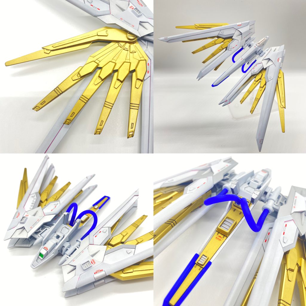 プラウドディフェンダーのゴールド羽部が寂しかったので、ディテールアップと一部延長。羽付け根外側のパテ埋めは、ほぼ見えず… エネルギーパイプは、設定とか深掘りせず面白いかなと思いつけてみました。リアル設定脳で考えれば、こんなハイリスクな仕様は、ありえないでしょうね(zaku-kao5)