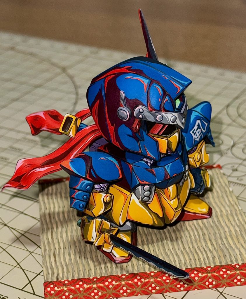 右上から夕焼けが当たっているイメージにしました。マフラーはシン仮面ライダーのプラモから拝借しました。