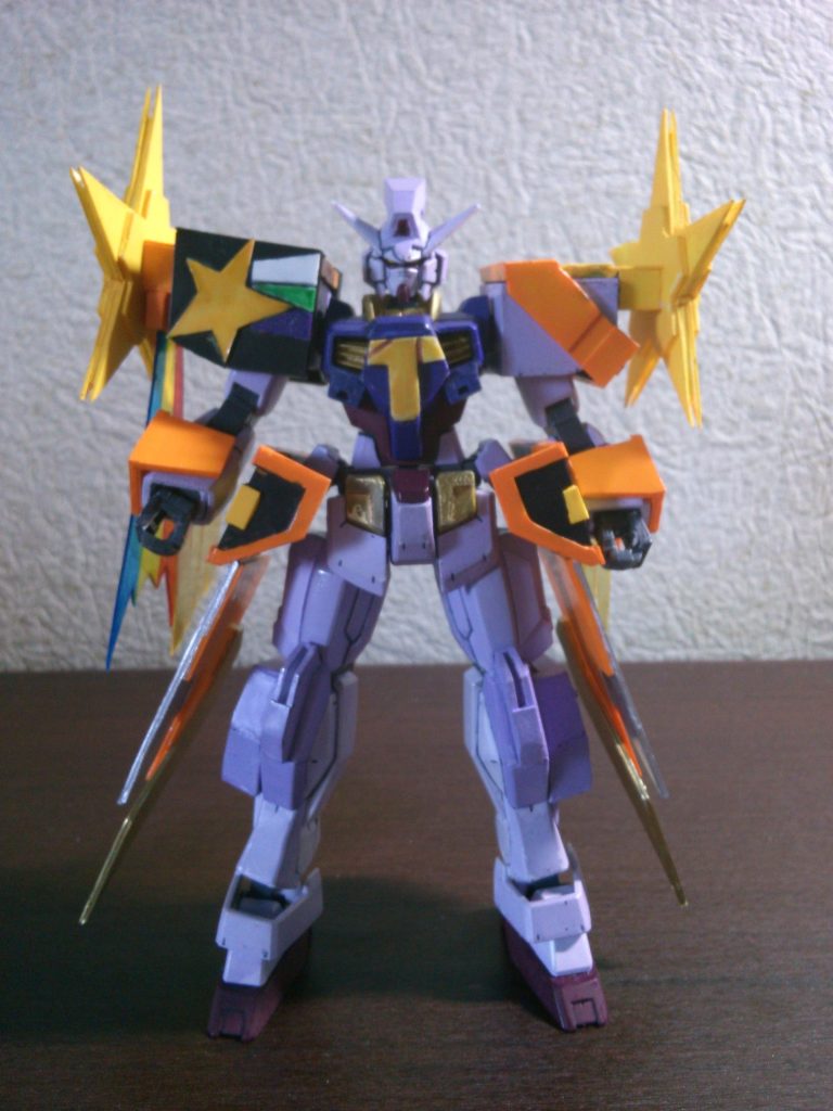 両肩の星型ビットなどを駆使して戦う。