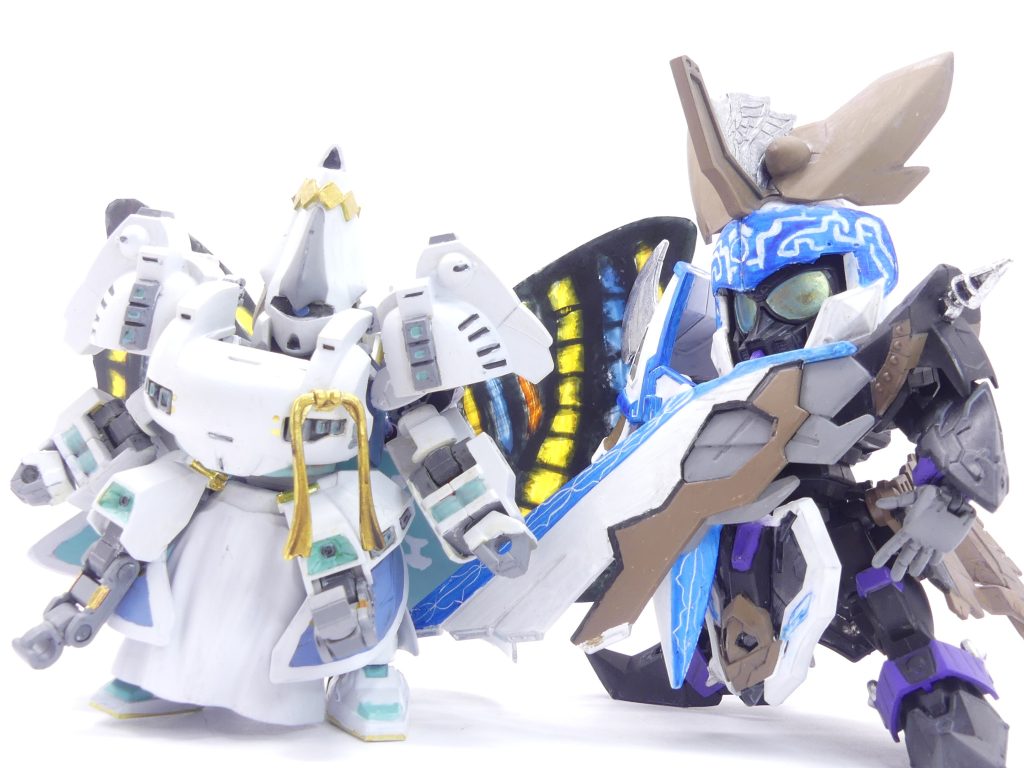 「やっと…役者が揃った。そう言うべきかな?」とある洞窟。そこには児雷也シナンジュ・スタインとともに、一人の「エバーランド」住人が待っていました。「ブリッジ」側は二人、ということになってしまうのですが…他のメンバーは忙しくもしくはエリア外。それでも「ガンプラ部」とガンニッパーを伴ってここに集まっているのは、早急に事を運ばなければならない事象が待っていたからです。「この近くで平和に暮らしていたところに…超巨大な「ミスク」!それが現れてね。さくっとやっつけてほしい。」彼…オベロンオーヴェロンは、王子様なので戦う力を持ちません。超巨大「ミスク」…「メガミスク」は既に付近の生態系に影響を与え始めており、放っておけばリージョン全体が危機に陥ります。3日後。そこで、「ガンプラ部」と「ブリッジ」は決着をつけることとしましたーー「怖かった。おんなじだ。いくらリトライできるって言っても、それはルール上のことだ…。」現実世界。それぞれが準備を整える中、アマミチの父・マサミチはかつての戦いを経験した者としてアマミチに語りかけます。「それでも戦った。大義があった。「エバーランド」を、平和にするって言うな。…アマミチは、どうだ?」…今は解らないから、ベストを尽くす。アマミチは、それだけ答え、黙々と作業にあたります。巨大な「メガミスク」には「ガンプラ魔法」だけでは足りない。だから、仕込もうとしていたのです。ガングリモワールの、「必殺技」をー【次回を待て!次回は筆者が万博に行く5月中旬頃までに…できるといいなぁ…】