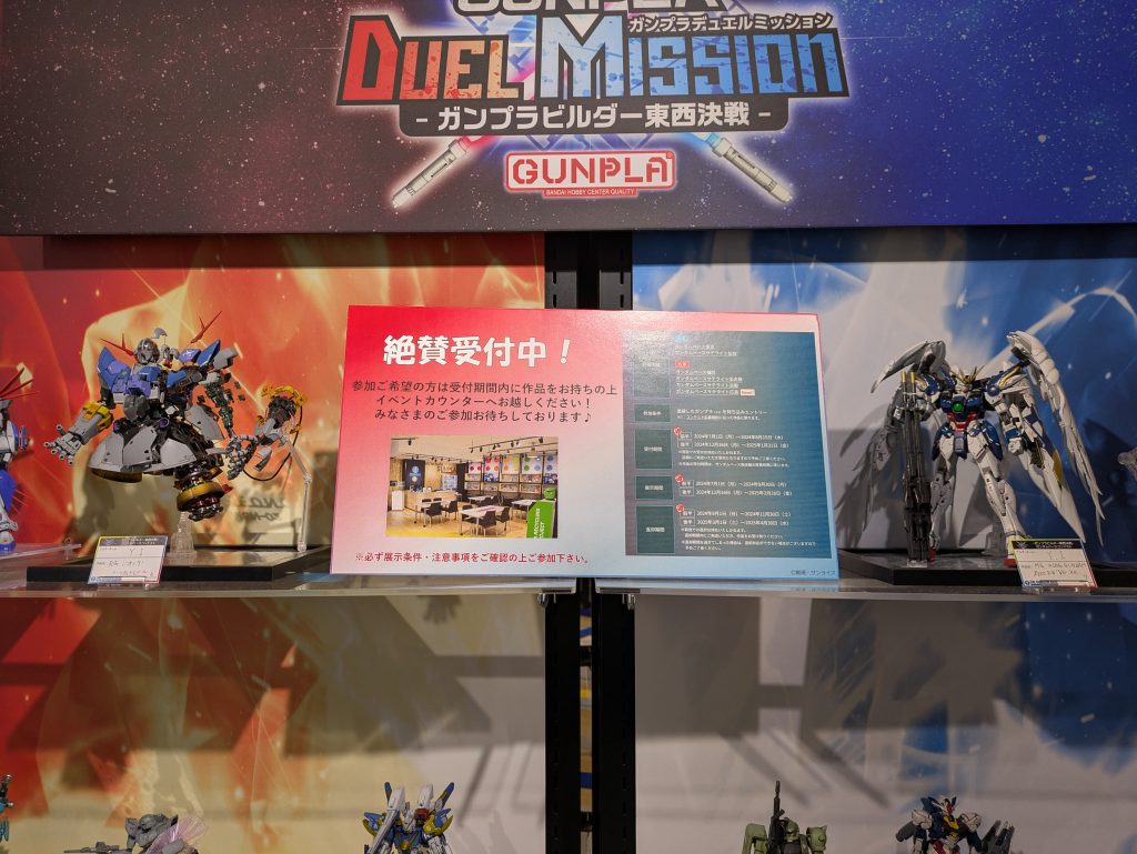 配置変更で一時的に告知ＰＯＰを私の作品が両脇固める状態に💦思わず笑いました⋯本命はＭＧウイングゼロでＲＧジオングは時間が余ったおまけで制作したのですが、普段は全塗装作品はめちゃくちゃ遅くて1～２ヶ月掛かるのに、怖いくらい順調に作業進んで、約半月で歴代最速ペースで完成してしまいました💦しかも周りからはジオングの方が好評で、複雑な気持ちになりました⋯もう一個の作品、ＭＧウイングゼロKaも同時に投稿しているので良かったら見てくださいい