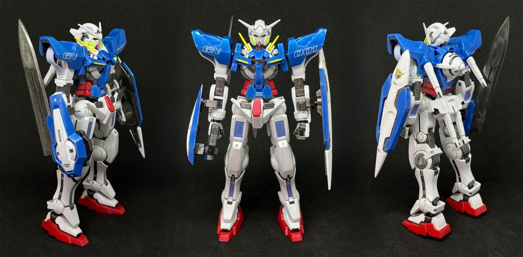 各アングル付属のシールは使わず、筆で塗り分け。肩のGNケーブルはゴム素材。ここのパーティングラインだけはけせなかった。青いパーツはエッジを際立たせるようにしてみたもののイマイチ効果がうすいか。素組み状態では、ほぼほぼ白と青で、なかなかのシンプル具合だったものだからどうしたものかと思っていたけれど、現在はかなり大満足。塗装すると本当にグッとそのキットの良さが引き出されると思う。いや、まだまだ精進あるのみだけど。最後までご覧頂き、ありがとうございました！