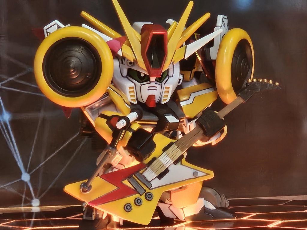 肩の大音量スピーカー×2に加え 額のハイメガキャノン砲すらもスピーカーである。発する声を高密度の圧力に変える新装備。圧力により相手からの飛び道具を弾き 自身が放つ実弾等を圧力により加速させる装置。決して歌う必要はなく 単に彼が歌いたいだけだ!耳を塞ぎたくなる様な大音量により相手を怯ませかく乱させるが偵察任務には向かない。ダブルゼータだけに大音量でサイレントヴォイスを歌う様はどの辺がサイレントなんだ!?と敵からの不評が相次ぐ中 隠れファンも急増中!?