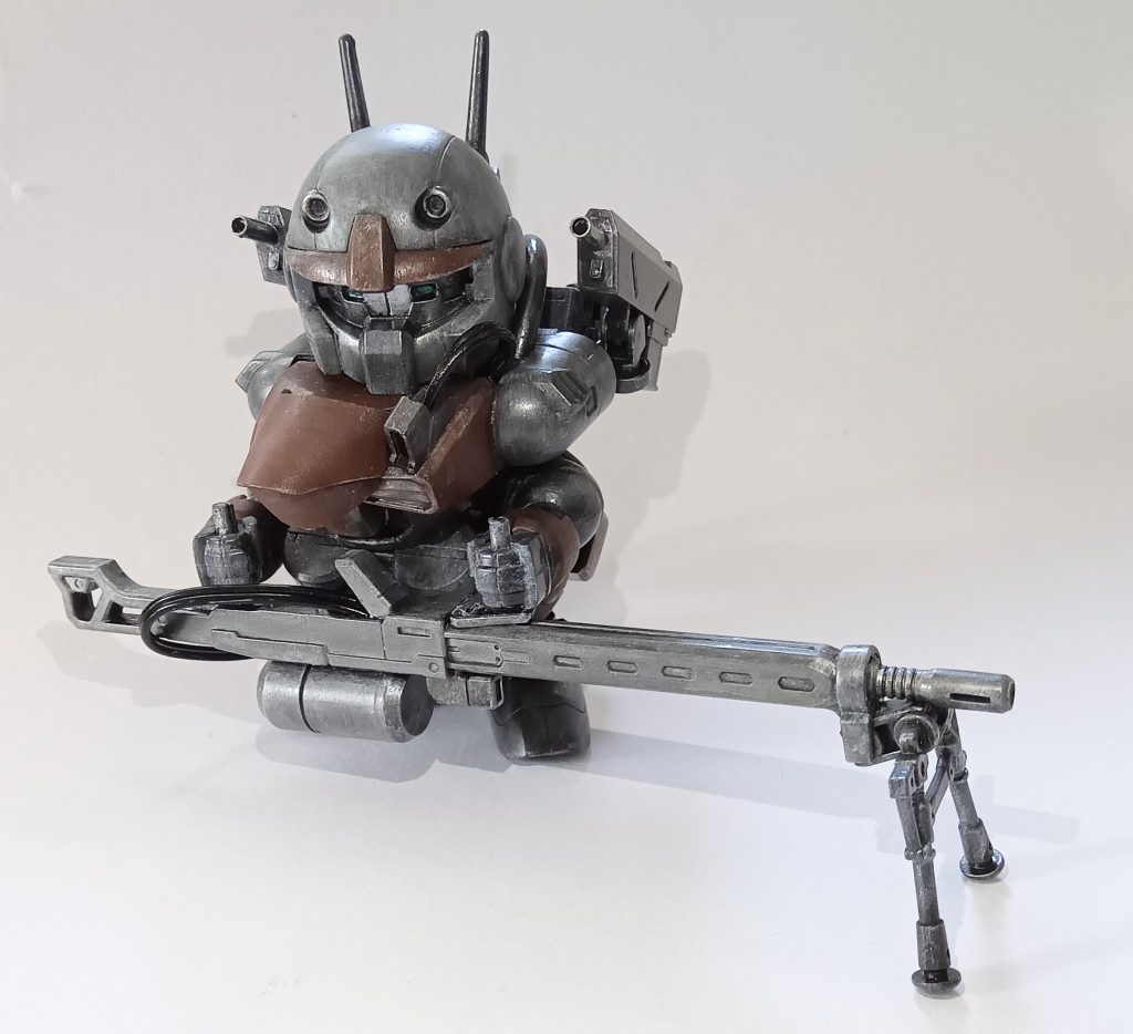 武装はタイトルにもある中隊支援砲。元ネタは「マブラヴ　オルタネイティブ」に登場する中隊支援砲そのまま。背部に「境界戦機」のバンイップ・ブーメランの機関砲を移植。