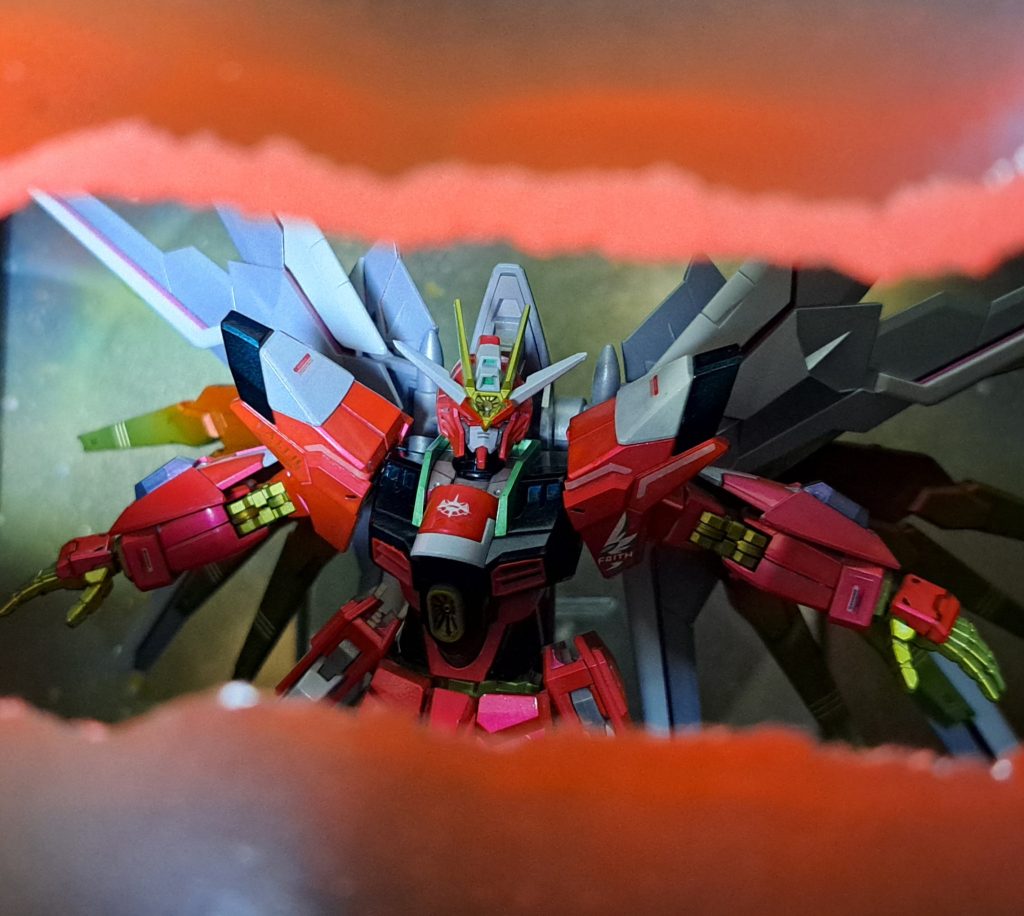 シュラ退場「俺が...負ける！？」機体ごとその身体を両断されたシュラ。自身の敗北を受け入れられないまま、機体の爆発に巻き込まれ戦死した。なおコンパス総帥の承認もなく、ディスラプタ－が起動したことに一部の関係者達(主にキラ、ラクス、ハインライン）は驚きを隠せなかった。