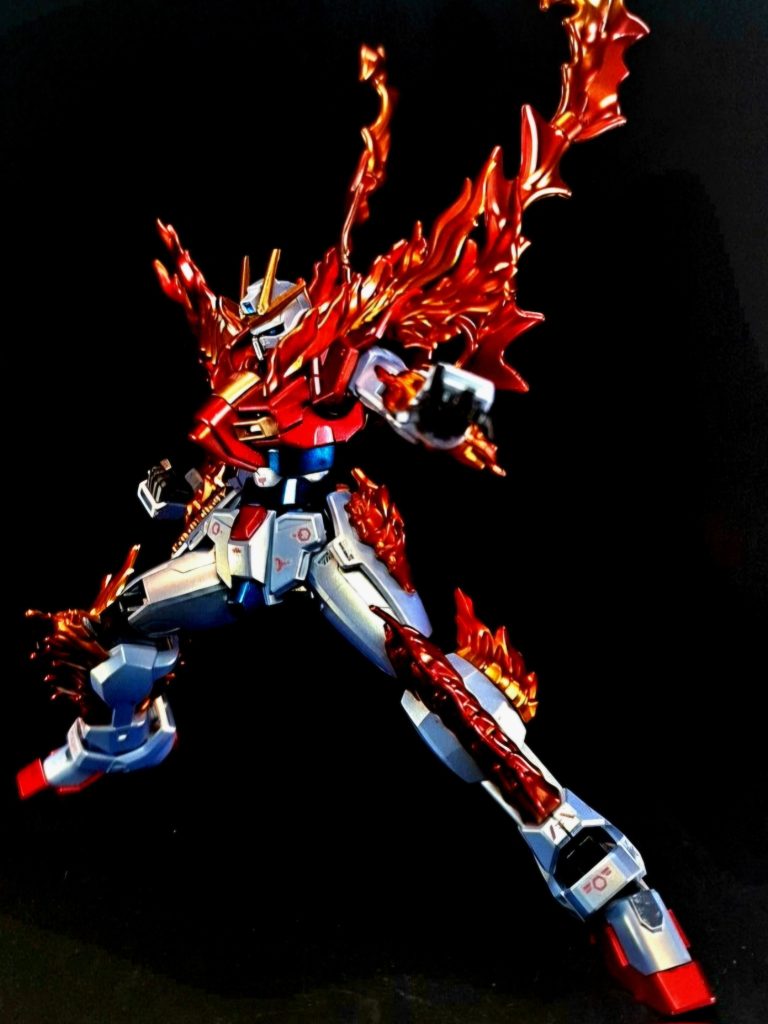 次元覇王流波動裂帛拳拳に纏った粒子の炎を地面に叩きつけ、敵機に向かって地表を走らせる技。空中の敵機に対しても攻撃が可能だが、地面の無いバトルフィールドでは使用できないと思われる。