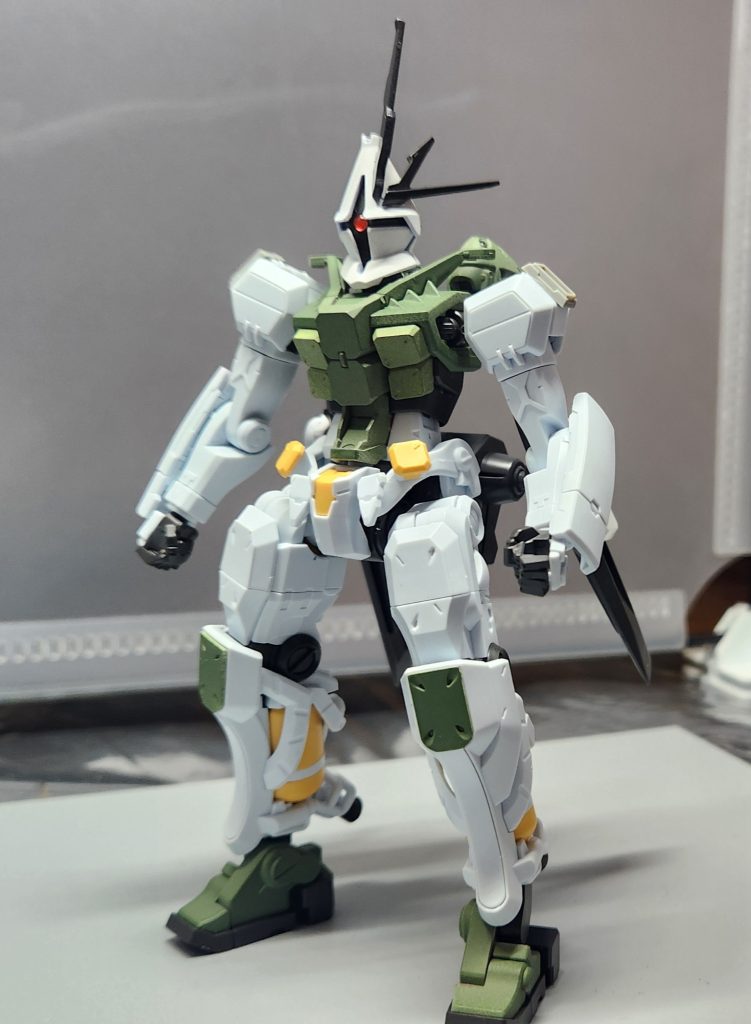 ゲルググを14回に渡って改装したという設定。モチーフはエヴァMark.10~12。頭部の十字が「X」、1本角は「I」、V型のアンテナは「V」全部合わせて「XIV(14)」。エヴァは13号機まであり、ゲルググは形式番号がMS14なので、エヴァMark.14的な形で作ってみました。