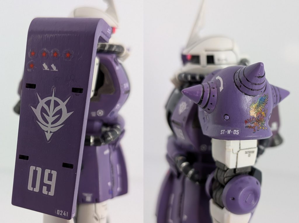 キリー機のエンブレムは、控えめにスパイク側に貼りましたが、デカールが曲面になかなか追従してくれず、マークフィットを使ったら使ったで塗膜がやられるなど、かなり難儀しました😥シールド側上部には、ガンダムデカールの撃墜マークを。白いデカールは艦艇の撃沈数らしいです(゜o゜;シラナカッタ