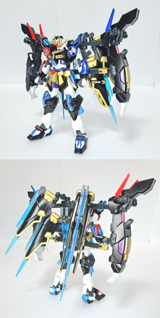 極神バーニングガンダム神バーニングガンダムをベースに、ウイングバーニングを2基と近接武器を増やし左右に巨大マニピュレーターを装備している。ある機体に患った大病を乗り越えたいつかの師匠を重ね、縁を感じこのカラーリングにした。