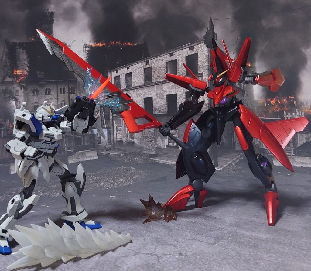 “オラァ！”異形のMSが、GNバスターソードを振るう。