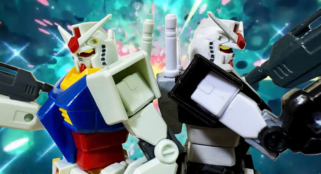 ジークアクス世界に現れた白と黒のガンダム。パイロットはタカとユージと同じ港署の元同僚である吉井刑事（通称パパ）と田中刑事（通称ナカさん）だった。エグザべ「バカな、なんて強さだ。こんなマヴ戦見た事がない！！」パパ「まったくなんで定年退職した我々までガンダムに乗らなきゃいけないんだ、えぇナカさん」ナカさん「鷹山と大下が言うには敵のニュータイプを引き付けてほしいとのことらしい・・・」パパ「それはそうとあのキラキラを通ってから心なしか俺達、若返ってるような気がするんだよな」ナカさん「ゼクノヴァはある意味アンチエイジング的な役割を果たしてるかもしれんな」2機のガンダムの教育型コンピューターにはタカとユージの戦闘データがインプットされており、おかげで素人同然の二人でもシャリア・ブルやエグザべとやりあう事ができるのだ。