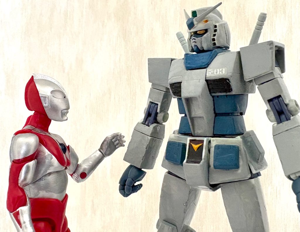 ウルトラさん「ガンダム君。君とはコンパチヒーロー以来の付き合いなんだけど、女子高生の前で大きくなるのは別の意味で問題あると思うんだよね」おっちゃん「ホンマでっか？あのくだり、コンプラ的にアカンのかいな」