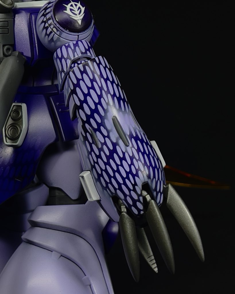 The snake pattern was created using a self adhevise stencil. I attempted to fade the pattern into the surrounding color. I wanted it to look like the snake skin was coming out of the armor in only some sections.