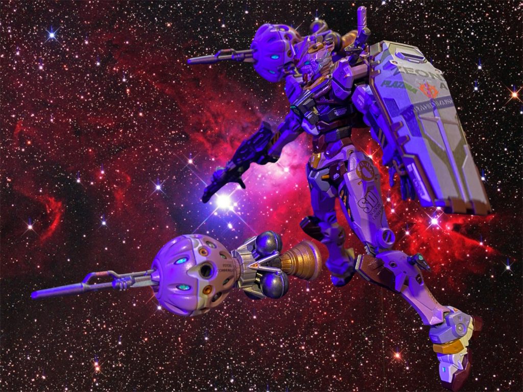 再建造の際、当時開発途中だったNT専用MA向けの試作α型サイコミュを、シャア大佐たっての希望によりフラナガン機関やジオニックの協力を得て実装。これにより、赤いガンダムは、ミノフスキー無線通信技術を応用した無人攻撃端末“ビット”を装備する機体となった。