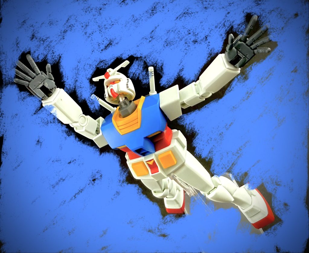 男は、男達は、やり遂げた。 ブレードアンテナの先端にフラッグを装着したRX-78が、耐熱フィルムを被った時、あの、割れるような歓声を。男達は、軍上層部は忘れられないだろう。…男達の汗と涙、そして、苦悩にまみれた。努力と知恵の物語を。…忘れないだろう。〜♪〜〜♫〜(0090年代に活躍したシンガー、ミユキ・カジマの楽曲「前照灯、後方赤色灯」が流れてくる) …この数ヶ月後。彼等に一つの情報がもたらされた。南米ジャブローへと向かうべく、大気圏突入を敢行した、第13独立部隊の強襲揚陸艦が、ジオン公国軍の追撃を受けながらも、大気圏突入に成功。そして、その艦の艦載機として運用されていたRX-78が、敵MSとの戦闘の末に、史上初となるMS単体による、大気圏突入に成功したと…。 男達の情熱は、MSの歴史を変え、RX-78のパイロット。…一人の少年兵の命をも守ったのだ。 男は見た。その一報を聞き、喜ぶ仲間の姿を。腕を高く突き上げる者、目頭を抑え、頭を垂れる仲間の姿を。男は見た。男は忘れることは無いだろう。…この、喜びを。