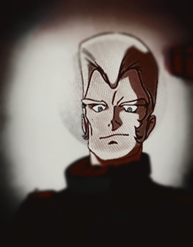 ブラン「 …誰かの都合で戦う事を強要され、それに抵抗しようとすれば精神の自由を奪われる…」　　「ウソ、嘘、うそで塗り固めた洗脳 」トロアのファイルを見る「 精神の安定の為の情報操作」「 本名の植付け、エイコ」「シイコ：スガイを妹と設定 」「 父親を総理府所属の要人と設定」「 、、、あの、ゴリラ野郎！！」バンっ！ブラン「 ん、？」　　　　「 何をやっている？」  