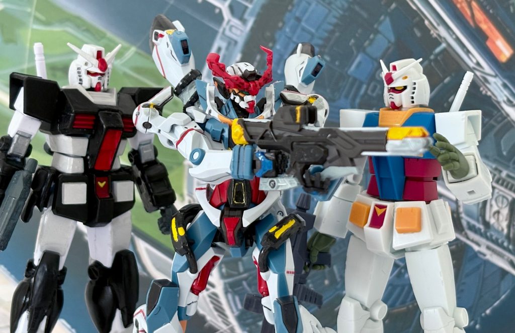 タカとユージにみっちり射撃の腕を鍛えてもらってるマチュ。タカ（プロトタイプガンダム）「もう少し脇を閉めろ。そうそう、イイ感じ」ユージ「引き金引くときは慎重にやるんだぞ。なんせフェザータッチにしてあんだからな」マチュ「わかった」ちなみにチーム名は「ポメラニアンズ」から「HYENAZ（ハイエナズ）」に改名したらしい。