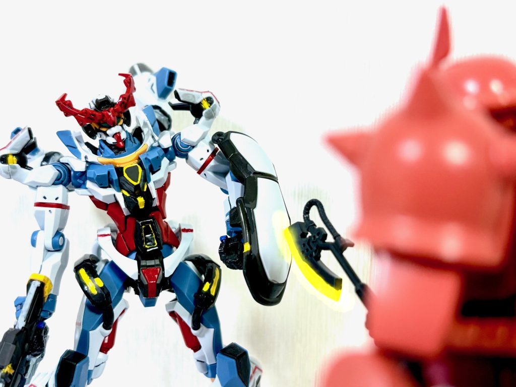 ケツアゴシャア「モビルスーツの性能の差が戦力の決定的差でない事を教えてやろう!!」ザクのヒートホークがジークアクスのシールドを引き裂く。エグザべ「くっ、なんて速さだ!これが赤い彗星なのか⁉」