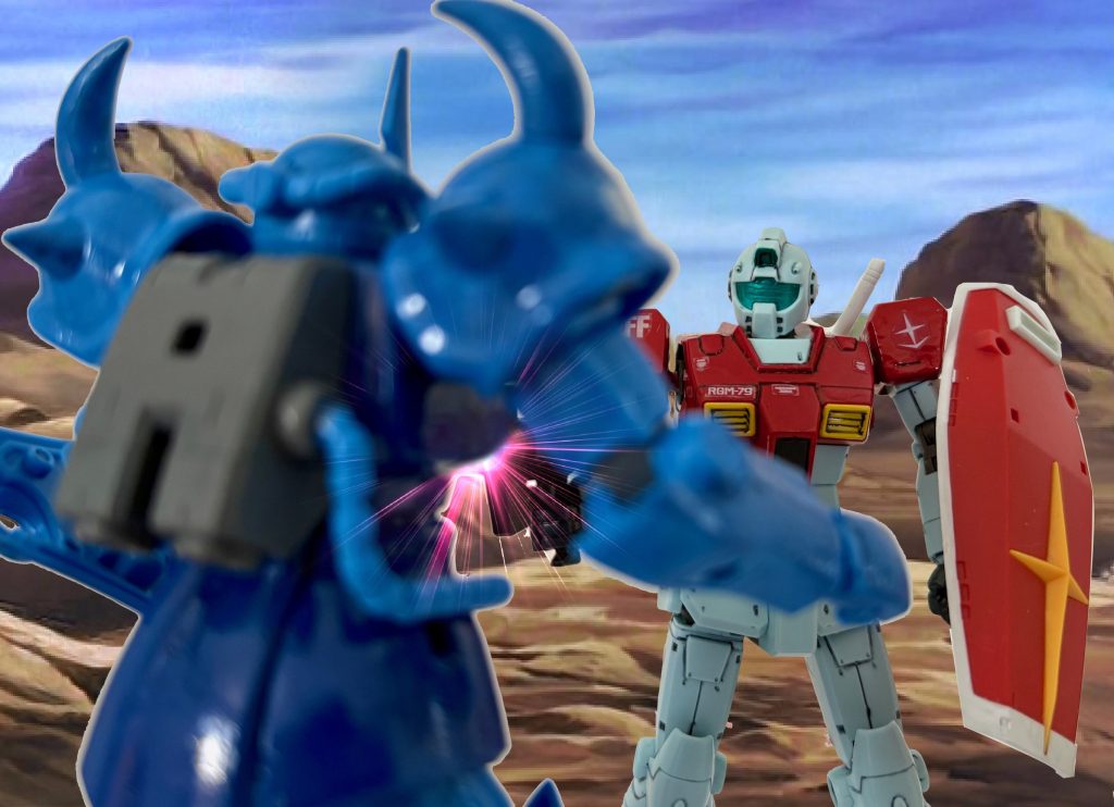 ビームスプレーガンがグフのコクピットを貫いた。それを見た別のジオン兵がGMの事をガンダムだと思い込みうろたえる。