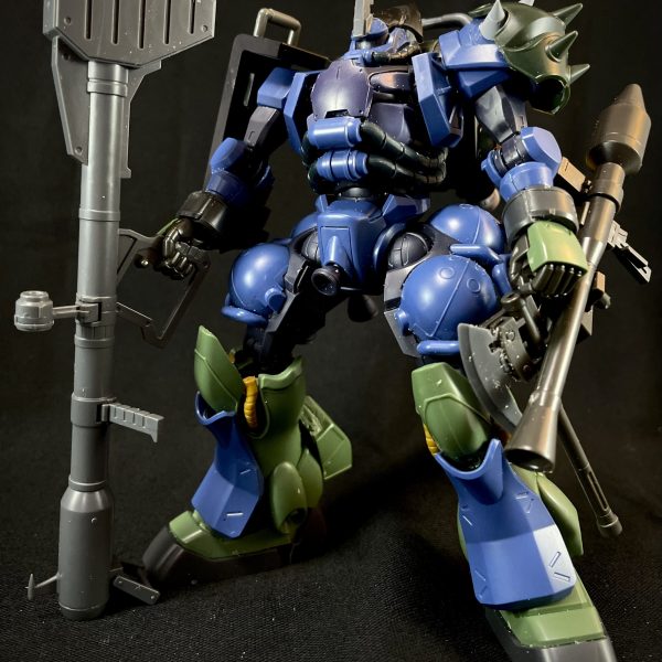 GQ軍警ザクを高機動型ザクに改造中です。ギラズールの親衛隊機をミキシング材料に選び、30MMやエコプラザクIIなどのパーツを使って作成しています。一旦、ミキシングプランができたので投稿です。バッグはギラズールをベースに高機動型ザクのバックパックっぽくパーツを追加しています。頭部アンテナはゴツめのものを選んでみました。ジャイアントバズを持ってきているので、ジョニーライデン専用機の高機動型ザクIのしてカラーリングしていこうと思います。 （3枚目）