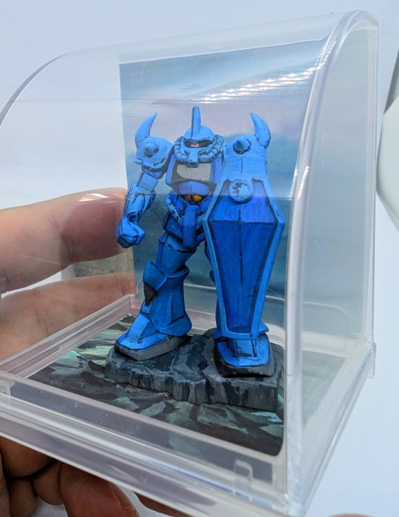 100均のアクリルケースがぴったり。いつもの100均インクジェットシールに背景を印刷して貼ってます。