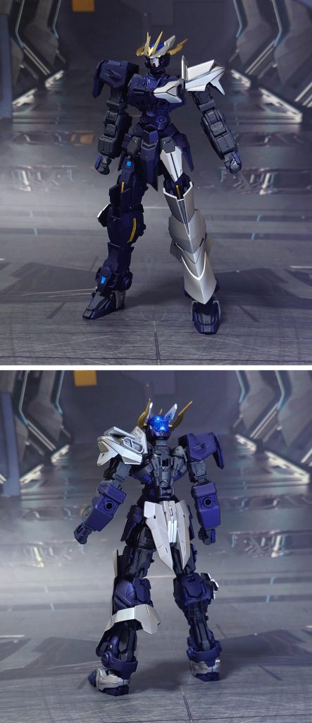 ガンダムアストレイノーネイム、素体状態で前後ろ。基本工作として、ゲート痕再処理、パーティングライン・段ズレ・ヒケの対処、面出し、肉抜き穴埋め、合わせ目消し、エッジ尖らせ、ディティールの穴開け、市販パーツ貼り付け・埋め込みによるディティールアップ。肉抜き穴埋めは首関節裏、足の裏、背中の突起(再現されていない手持ちビームサーベル)、ノーネイムライフル裏側の一部に実施。合わせ目消しは肩関節、上腕、前腕、右前腕ガントレット、股関節(太腿側)、ノーネイムライフルの一部、ロッドの一部に実施。リメイク前からの仕様として、ノーネイムとは異なる、アストレイ通常の両腕を差し替えパーツとして用意。(むしろ、元の左前腕が行方不明…)