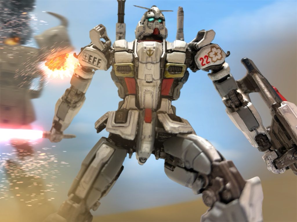 ヘントは、サーベルをさっと横に薙ぐと、敵のサーベルを待つ手を切り落とす。機体がぶつかり合った直後、互いが一歩退いたその瞬間、返す刀で敵の頭部を撥ね飛ばす。メインカメラを失って、ふらつく機体の、両脚を薙ぎ払うと、”血濡れの左腕”は遂に沈黙した。~~~~~~~~~~~~~~~