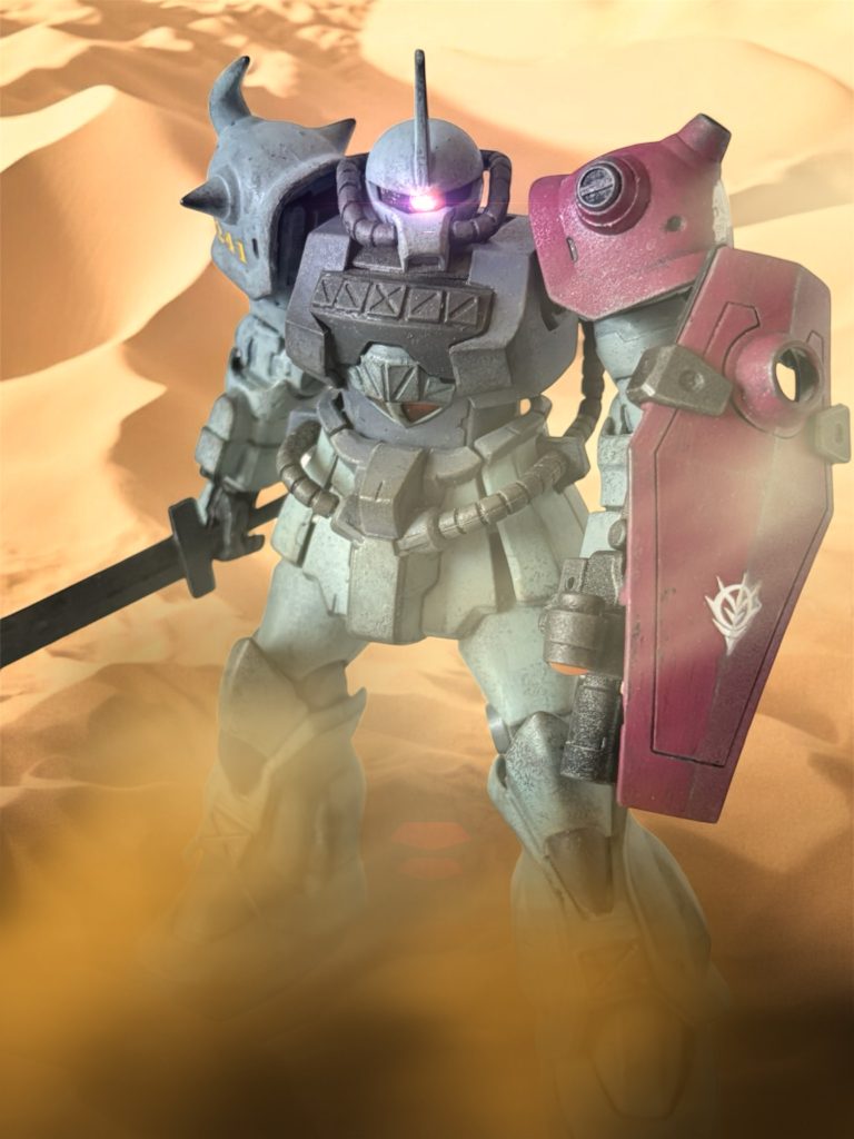 「捕虜にした、”血濡れの左腕”は?」 ヘントは、自分が撃墜した”血濡れの左腕”のパイロットのことを尋ねた。 アーサー・クレイグ大尉と名乗ったパイロットは、投降した際も堂々たる態度で、南極条約に則った処置を要求した。 金髪碧眼のなかなかの美丈夫で、基地内のウェーブ(女性士官)たちの間で一時騒ぎになったという。「何も喋らんし、喋らせる気もないだろう。ただ、やっぱり、オデッサでお前をやったグフは、あいつだったみたいだな。」 自分で仇を討ったわけだ、とイギーは感心した。 それよりも、あの時、彼を殺せなかったのはなぜだろうか。ミヤギの声が聞こえた気がしたが、あの時、ミヤギは気を失っていた。だとしたら、この男を殺してはならないと、自分の深層心理が働き掛けたのか。縁もゆかりもない彼に、なぜ——。