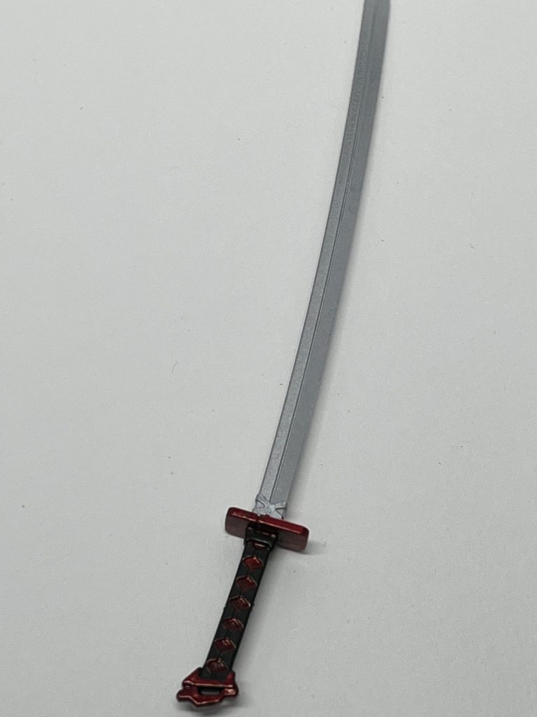 武装両肩のアストレイ日本刀をそのまま禍々しい機体に合わせて柄は赤と黒をチョイス腕の鞘にある真打は確かバルバトスか境◯戦記の物を拝借しております