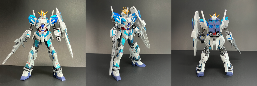 関節はつや消し〜半ツヤぐらいでも良いかなと思ったのですが、サイコフレームがめちゃくちゃギラギラ光ってるので通常のムーバブル・フレームも負けないくらいギラギラさせちゃった方がいいかなーということでスターブライトアイアンそのまま、ビームライフルだけはつや消し仕上げにしているので少し質感が変わってるかなと。ガンダムベースの限定品では白とグレー部分がサイコフレームの反射をイメージした青寄りの色に振ってあったのですが、今回はせっかく塗るんだしというわけで白もグレーもあえてウォームカラーにしてみました。コアファイター部分に使ったヘビィコバルトブルーがめちゃくちゃ好みの色だったのでなにか別の機会にも使ってみたいですね。(瓶単価がちょっと高いのが玉に瑕ですが)盾裏のミサイルとビームキャノンは最後の最後で気づいて妥協しました(肉抜き埋めるのめんどかったので)デカールはガンダムデカールのMGVガンダムVer.Ka用と閃光のハサウェイ汎用から適当に。いちいち産地主張してどうすんねんってことでAEロゴ貼るのあんまり好みじゃないんですが、この機体はまあもともと試験機だしってことでシールドにだけちょろっと貼っときました。コーション類はあんまり貼りすぎても煩いかなと思ったのと、シンプルに貼るのが面倒だったので、ちょうど仕上げをやってたタイミングで発売になったMGナラティブの貼り付け位置と内容を参考にして要所要所に。 使用塗料各部白：[C]グランプリホワイト各部グレー：[G]マイスターウォームグレー[HJモデラーズカラー]胴体/頭部赤：[G]ローズディープレッド[バーチャロンカラー]+[C]シャインレッド(朱色) 1:1コアファイター部青：[G]ヘビィコバルトブルー[HJモデラーズカラー]ソール/バックパック青：[G]マーズダークブルー[バーチャロンカラー]関節：[G]スターブライトアイアン　光沢仕上げビーム・ライフル：[G]スターブライトアイアン　つや消し仕上げつや消しコート：[G]Ex-フラットクリアープレミアムメインカメラ、カメラアイ：[G]蛍光イエロー＋[G]プリズムパステルミントグリーンブルー 瓶ごと混色サイコフレーム部：[G]アルティメットブラック→[G]プリズムメタリックターコイズグリーンライトブルー→[G]蛍光ブルーその他スミ入れ部分塗装等：タミヤエナメル　フラットブラック・ジャーマングレー