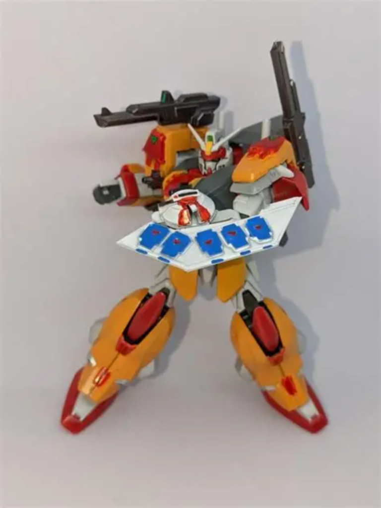 『アタックシールドブースター』シールドに二連装砲と高機動バーニアを装着した装備です。