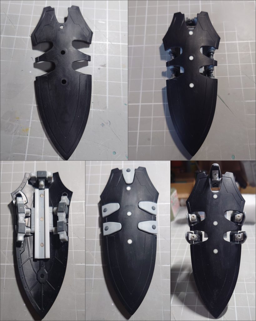 シールドの加工画像。開閉機構は、30MMのパーツを使用。シールド裏にレールを仕込み、装備時に上下にスライドします。開閉部のカバー部分は、1mmプラ板を貼り厚みを持たせてます。