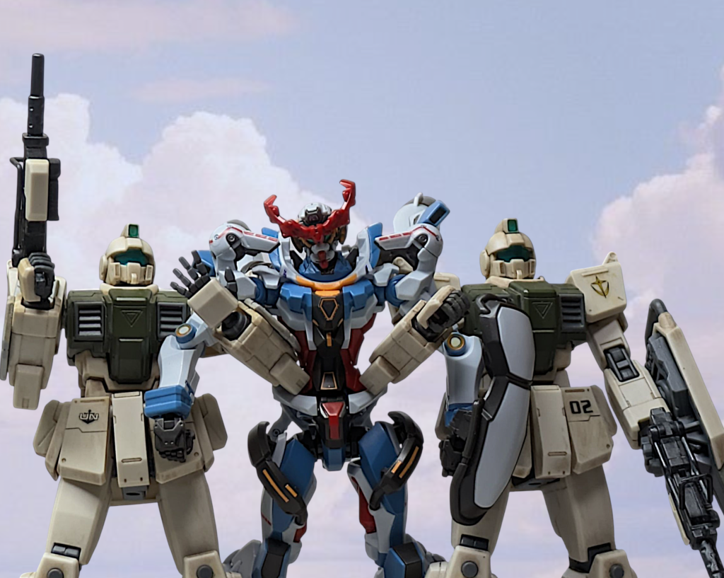 エレノア・リルらが味方機に偽装してこの駐屯地に接近している事を知ったミケルらNGO職員と避難民たちは駐屯地のバンカーに隠れていたが、そのバンカーで目を覚ましたマチュにいろいろ問い詰められ、更には損傷したあの機体で行くと言い出したためミケルはマチュを慌てて止めたが、それで引くマチュではなかったためミケルは引きずられる形でジークアクスの応急修理をする事になってしまった。ミケル[ここにエレドアさんがいたらヘタレとか言われそうな話ですよね…]サンダース[だが、結果としてお前の修理が間に合ったおかげであの機体は間に合い、ハモンドも助かった。ミケル、お前のおかげだろ]ミケル[応急修理ですが修理はしましたが、自爆装着とか組み込まれていて僕は敵が来て殺される前にあの機体に殺されると思いましたよ!…まぁ、今は専属メカニックがいるので素人の僕が出る幕はもうないでしょうけど]溜息混じりにミケルがそう言うとサンダースは怪訝な顔をした。サンダース[お前、まさか聞いてないのか?]