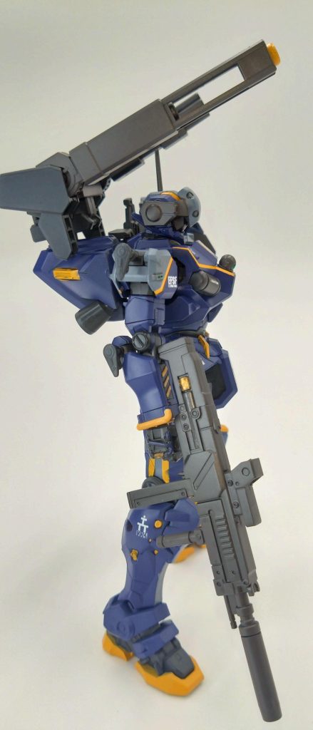 一年戦争で活躍した連邦量産型MS軽キャノンの発展型で連邦再編計画の一環として開発した汎用量産型MSで先の戦い配備時期の遅さとパイロットの練度の不足で軽キャノンの性能データが少なく結果戦後軽キャノンの性能は一年戦争のスペックはかわらないのである。このままでは今後のジオンMSには勝てないと思い連邦は軽キャノンの性能は変えず肩・腕・太腿についてるハードポイントで武装・装甲などで性能を底上げさせることに決定した。