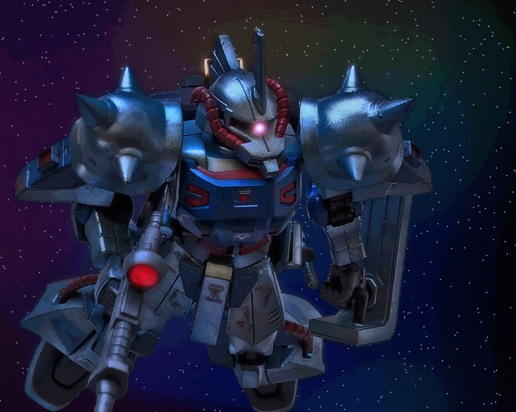 「前が騒がしいわね…、トライバルの連中は何をやっているの？」戦闘の激しさが増す前線に本国親衛隊隊長ロゼット・メイカーは呟いた。戦況は思ったより好転しておらず拮抗しているようだ。「…さて中佐、我々は準備が整ったので先に失礼させてもらおうか」ノアズ・アーク艦長のヴァルク・フォーリナーはそう言うとクルーに合図を出す。するとノアズ・アークのメインスラスターが点火する。「待ちなさいっ、まだ話しは終わっていないわよっ!?」「続きはサイド3でするとしよう中佐。もっとも貴官と話す事はもうないだろうがな」「勝手な事抜かしてんじゃないわよジジイっ!!その艦を盗んでタダで済むと思ってんのっ!?」「元々この艦は木星船団の物だ。一般の軍の管理化に置かれているものではない」「だからってっ…!!」「機関最大戦速、目標サイド3本国!!」ヴァルクがロゼットの言葉を遮るとノアズ・アークはその巨体をゆっくりと前進させる。ジオン軍の中でもトップクラスのペイロードを持つ艦艇のスラスターから発する噴射剤はその勢いも桁違いであった。白く眩い光が周囲を照らすと一気に加速しだす。