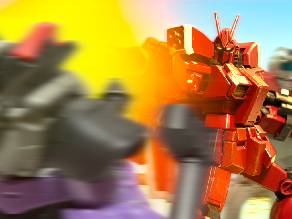 「来たよ!来たよ、来たよ!」 シートの後ろで、カルアが歓声をあげる。「黙ってろ、舌を噛むぞ!」 目の前のザクの腹に、ビームライフルで風穴を開ける。「素敵!壊してるとき、そういう顔してるのね!」首を伸ばして、ヘルメットの中の横顔をのぞき込もうとしてくる。「おい、邪魔だ!」「ほら、右!」今度はドムだ。レッドウォーリアは右のバズーカで敵機を粉砕する。カルアや、アイザックとかいうのが乗っていた黒いドムではない。「少佐やアイザックは来ないのか!?」「分かんない、みんな飛び回っているから、感じない!」「分かったら教えろ!」言いながら、敵陣のさらに奥へと機体を走らせる。『”チェリー”先行しすぎだ!』 ケーン中尉から通信が入るが、ジンは機体を止めない。「だって、赤いのと俺との、一騎打ちをお望みでしょう!」「”チェリー”って、コールサイン?」カルアが楽しそうに笑う。「そうなの?」「うるさい!」「そうなんだ!可愛い!」「うるさいと言った!」「あ、来た!」 カルアが叫ぶ。