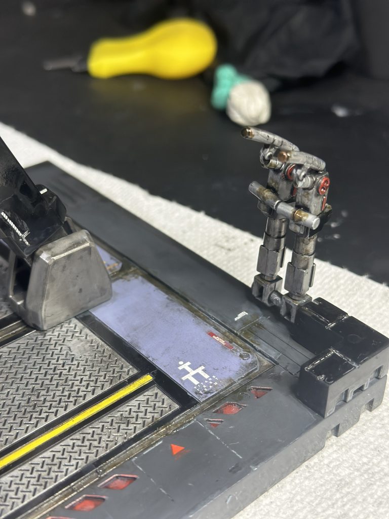 Adding fuel residue detail with gaianotes enamel “oil” color.